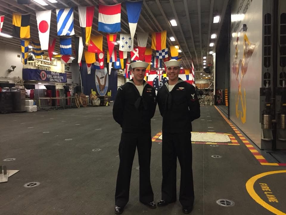 USS Bonhomme Richard hangar deck with international signal flags